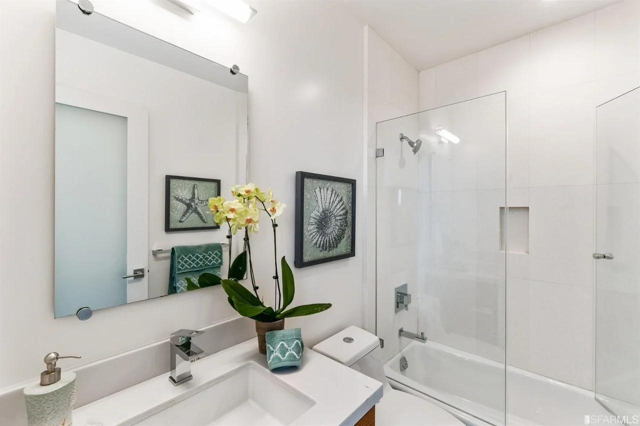 Bathroom vanity in home addition with modern mirrors and bright lighting — San Francisco Bay Area general contractor