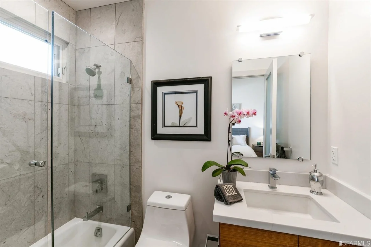 Bathroom in home addition with glass shower and tile surround — San Francisco Bay Area general contractor