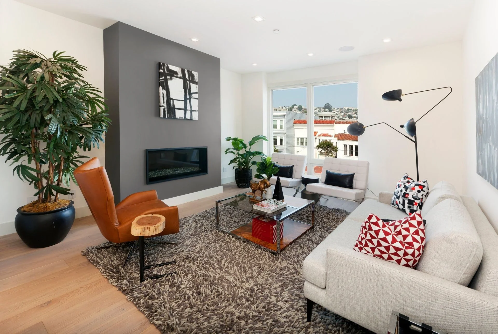 Living room update with fireplace feature and media wall in Bay Area condo — San Francisco Bay Area general contractor