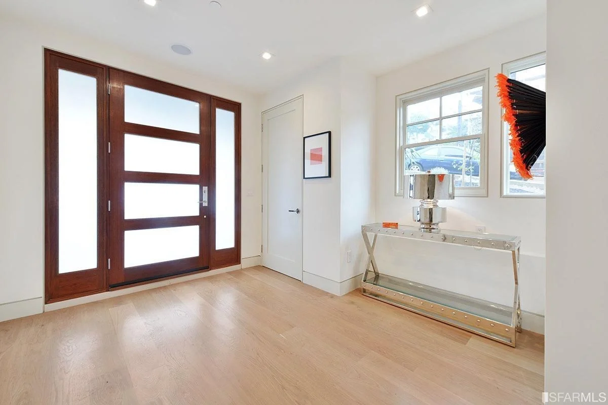 entryway addition with storage closet and finished flooring—SF Pinnacle General Contractor