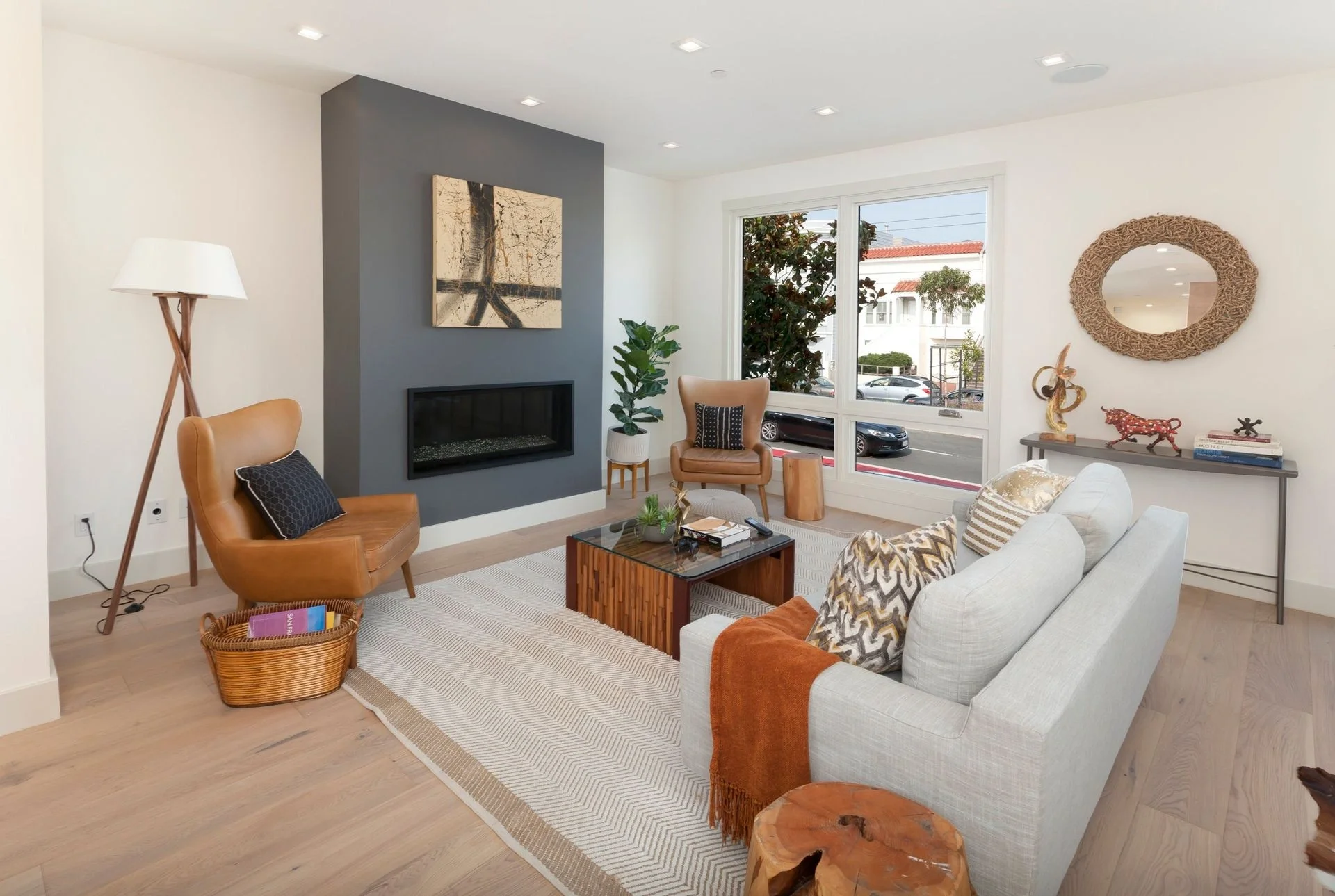 Finished condo living room remodel with updated flooring and modern furniture — San Francisco Bay Area general contractor