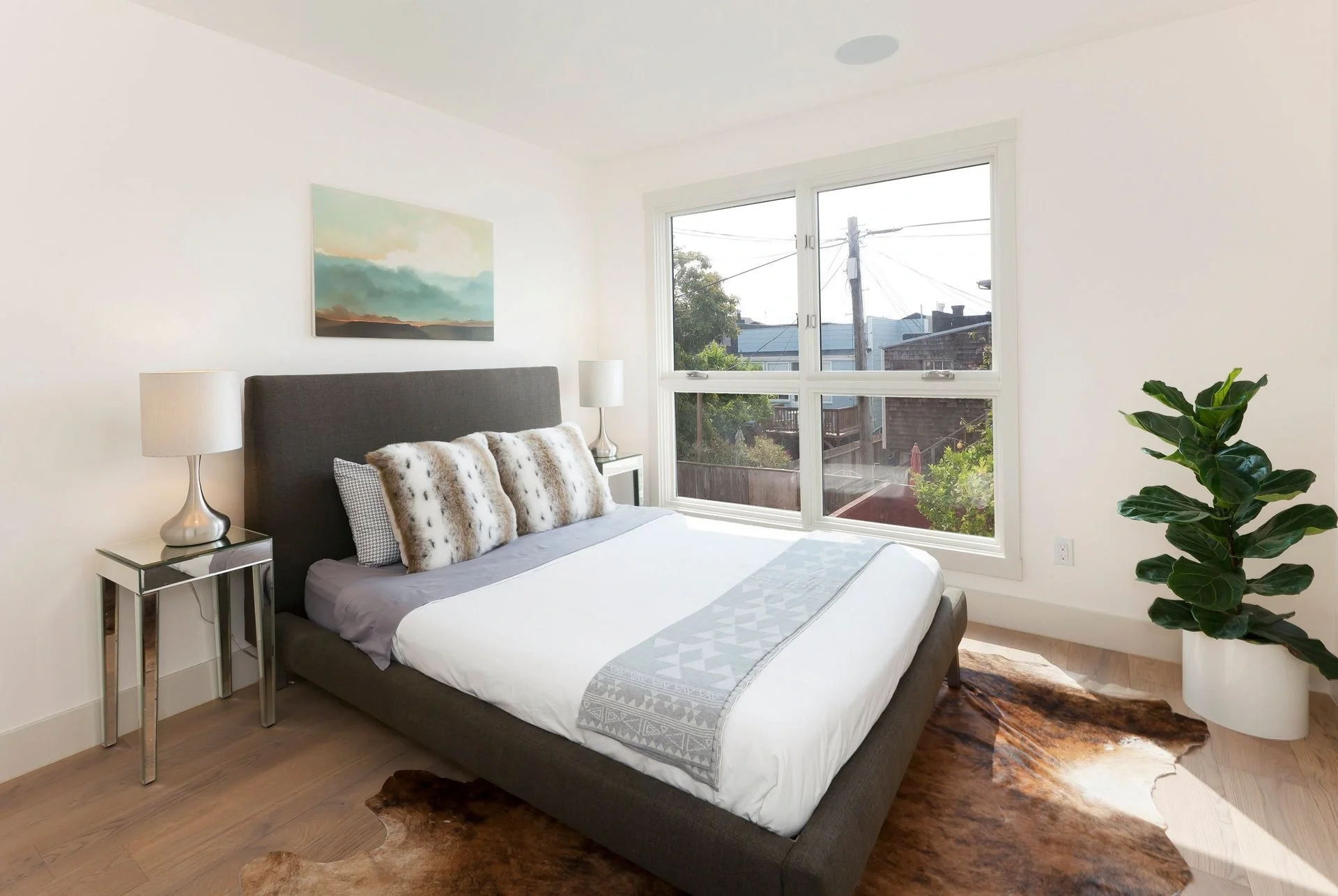 Bedroom remodel with updated flooring and natural light — San Francisco Bay Area condo general contractor