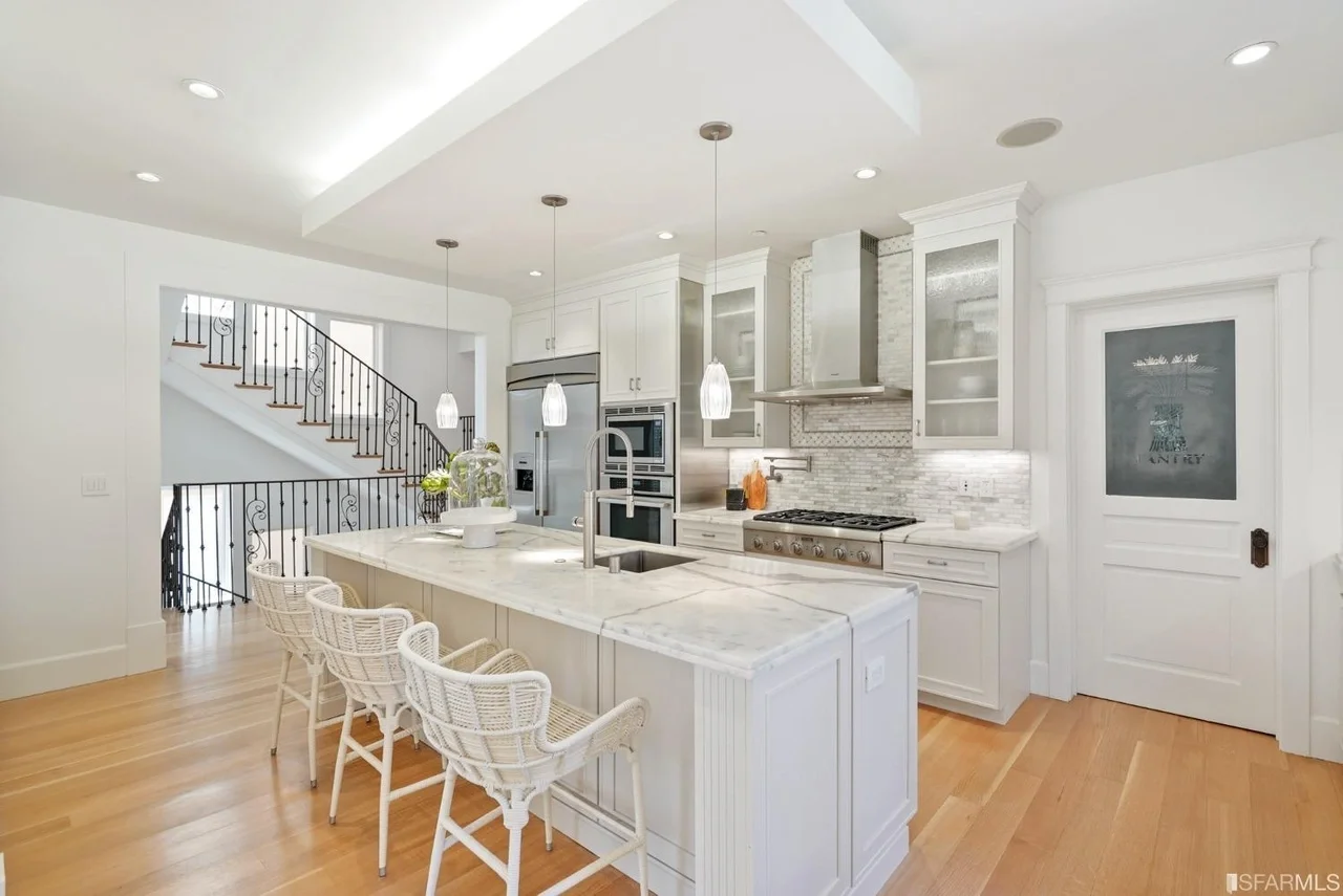 Open kitchen upgrade featuring a spacious island, clean lines, and durable finishes, open kitchen remodel with island seating — San Francisco Bay Area general contractor.