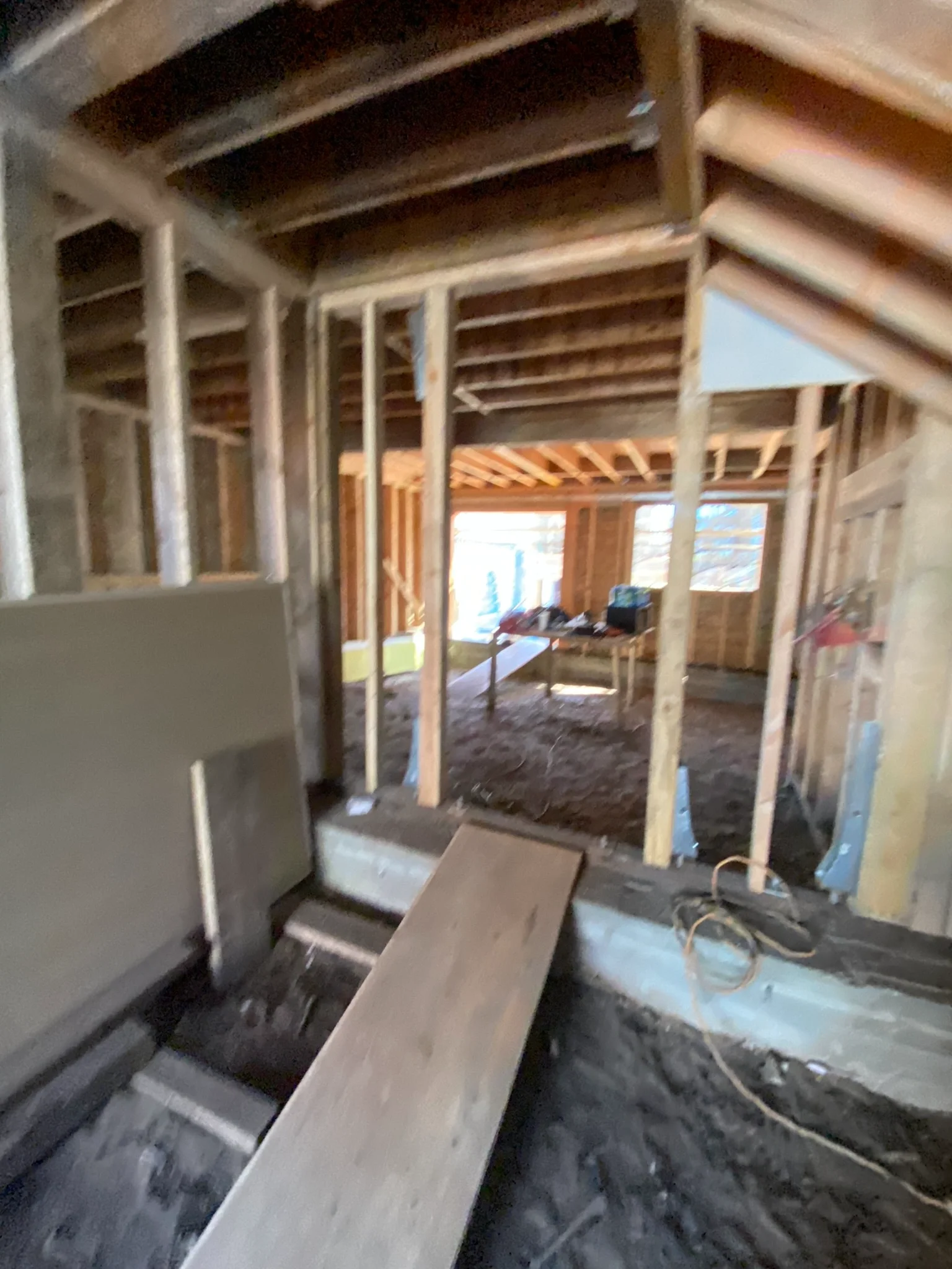 Two-story detached ADU framing view through new partitions and doorway openings — San Francisco Bay Area general contractor