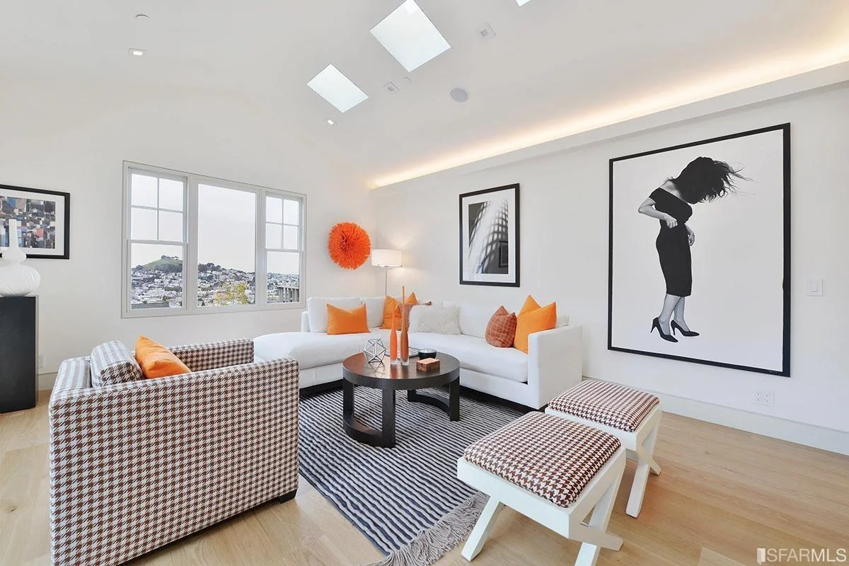 living room with skylights, recessed lighting, and modern seating — San Francisco Bay Area general contractor