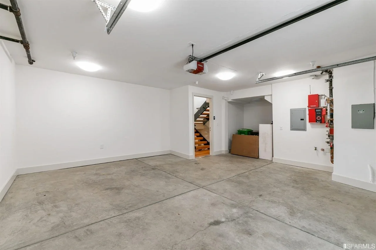 Garage renovation with finished walls and overhead door — San Francisco Bay Area general contractor