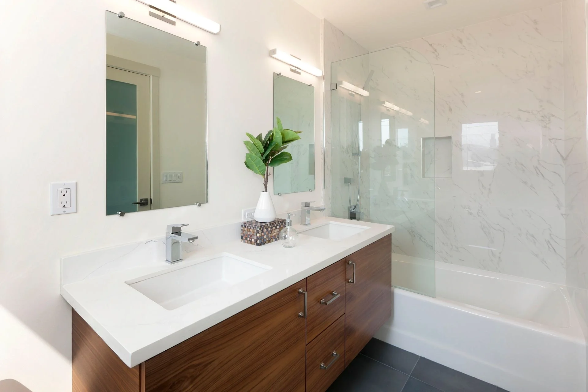 Bathroom vanity upgrade with wood cabinet, mirror, and updated lighting — San Francisco Bay Area general contractor