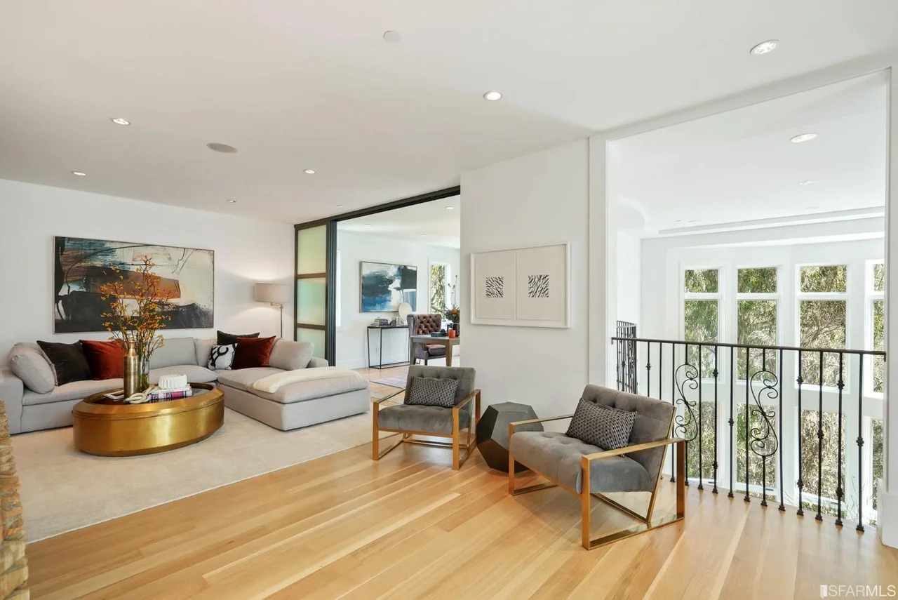 Family room remodel with hardwood floors and large sliding doors — San Francisco Bay Area general contractor.