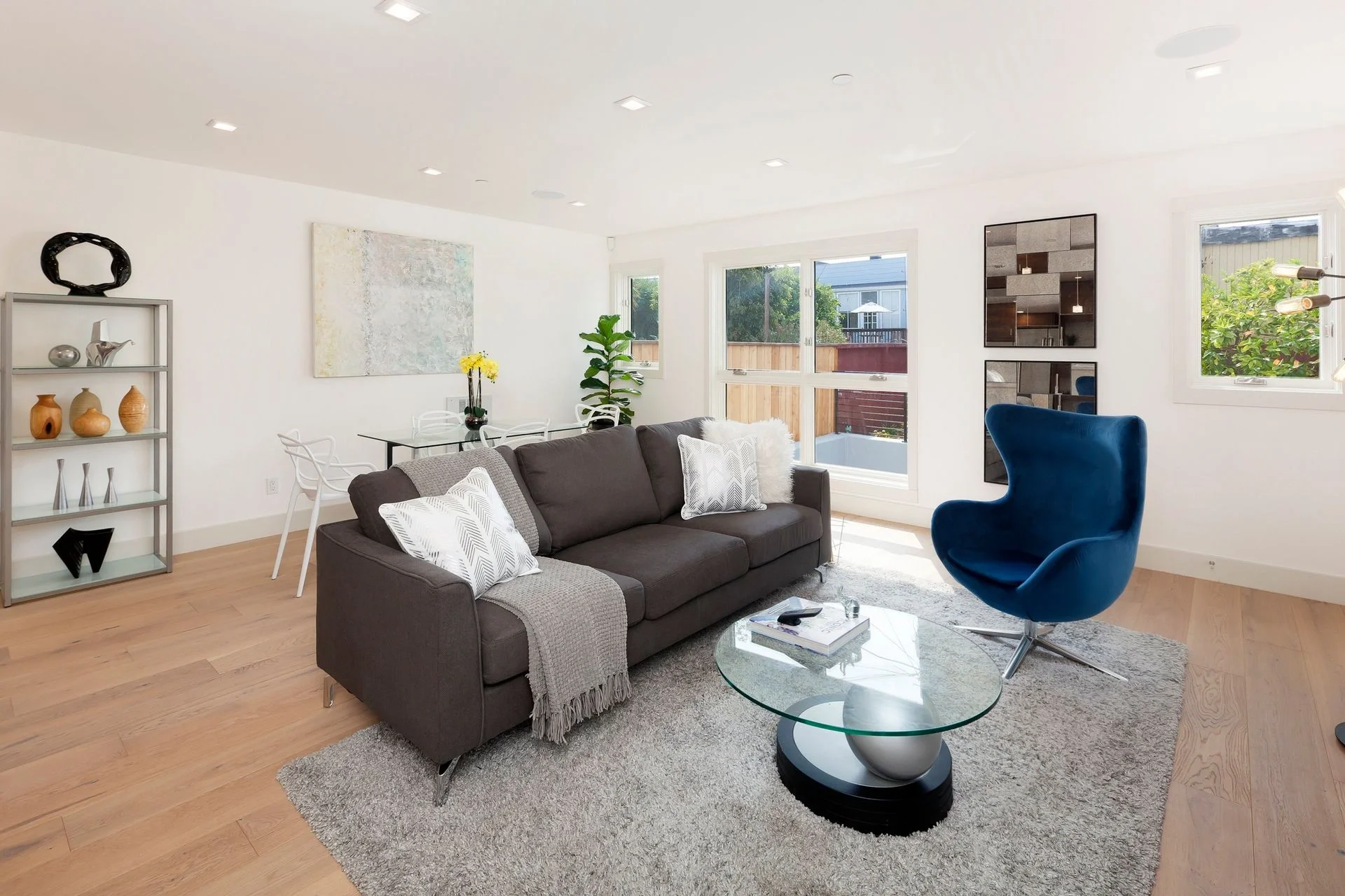 Open-concept condo living room with modern seating and clean finishes — San Francisco Bay Area general contractor