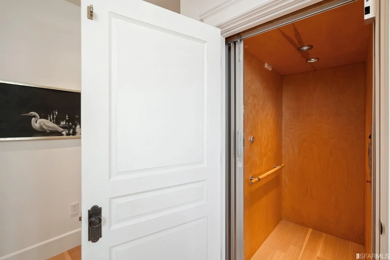 Sauna room with tiled walls and modern fixtures — San Francisco Bay Area general contractor.