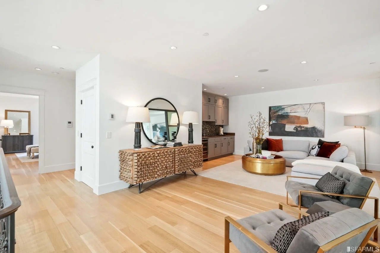 Main-floor renovation with open layout, hardwood floors, and updated lighting — San Francisco Bay Area general contractor.