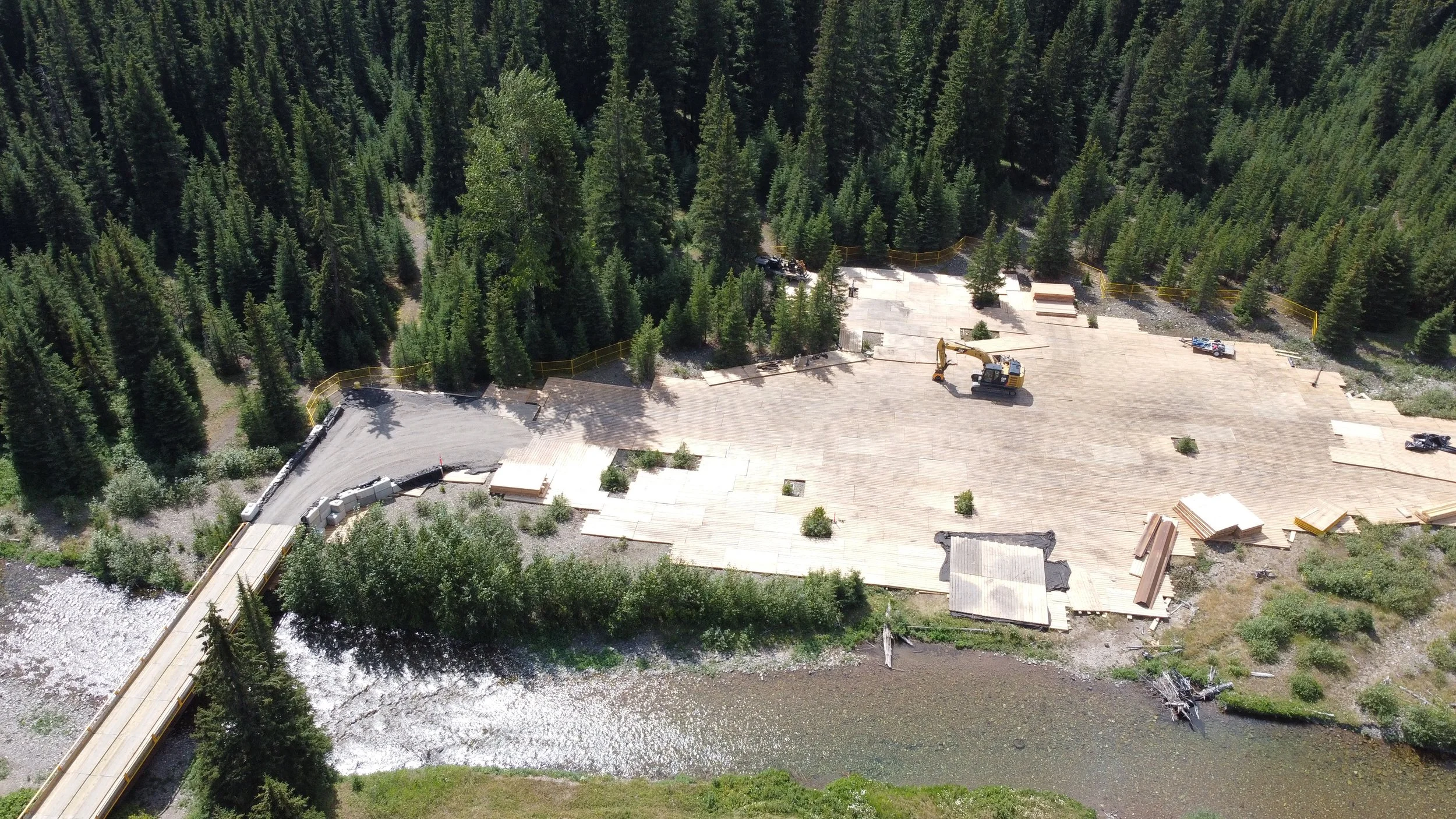 Site preparation in a sensitive park setting along West Castle River corridor.