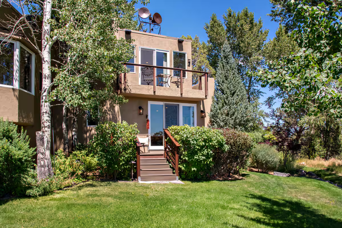 Guesthouse ~ view of back of home.png