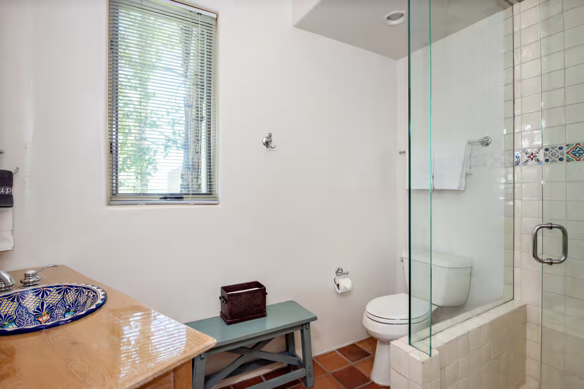Guesthouse - full bathroom with walk in shower.png