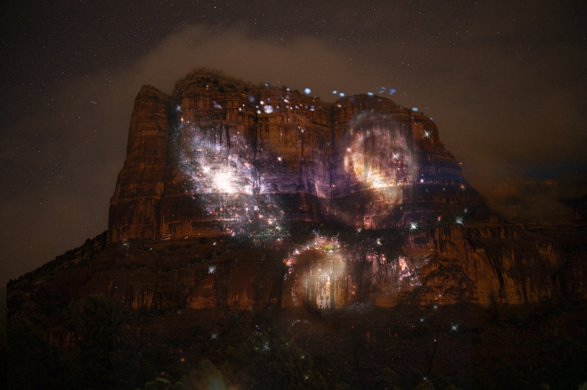Stephan’s Quintet on Courthouse Butte, Arizona

11/23/2025

Stephan's Quintet, a group of colliding galaxies 300 million light years away, is projected on Courthouse Butte, Arizona, 300 million years old.

Galaxy image credit: NASA, ESA, CSA, and STS