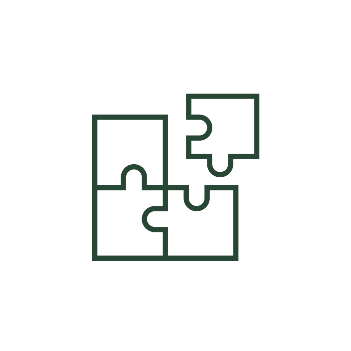 Outline of four interlocking puzzle pieces on a black background.