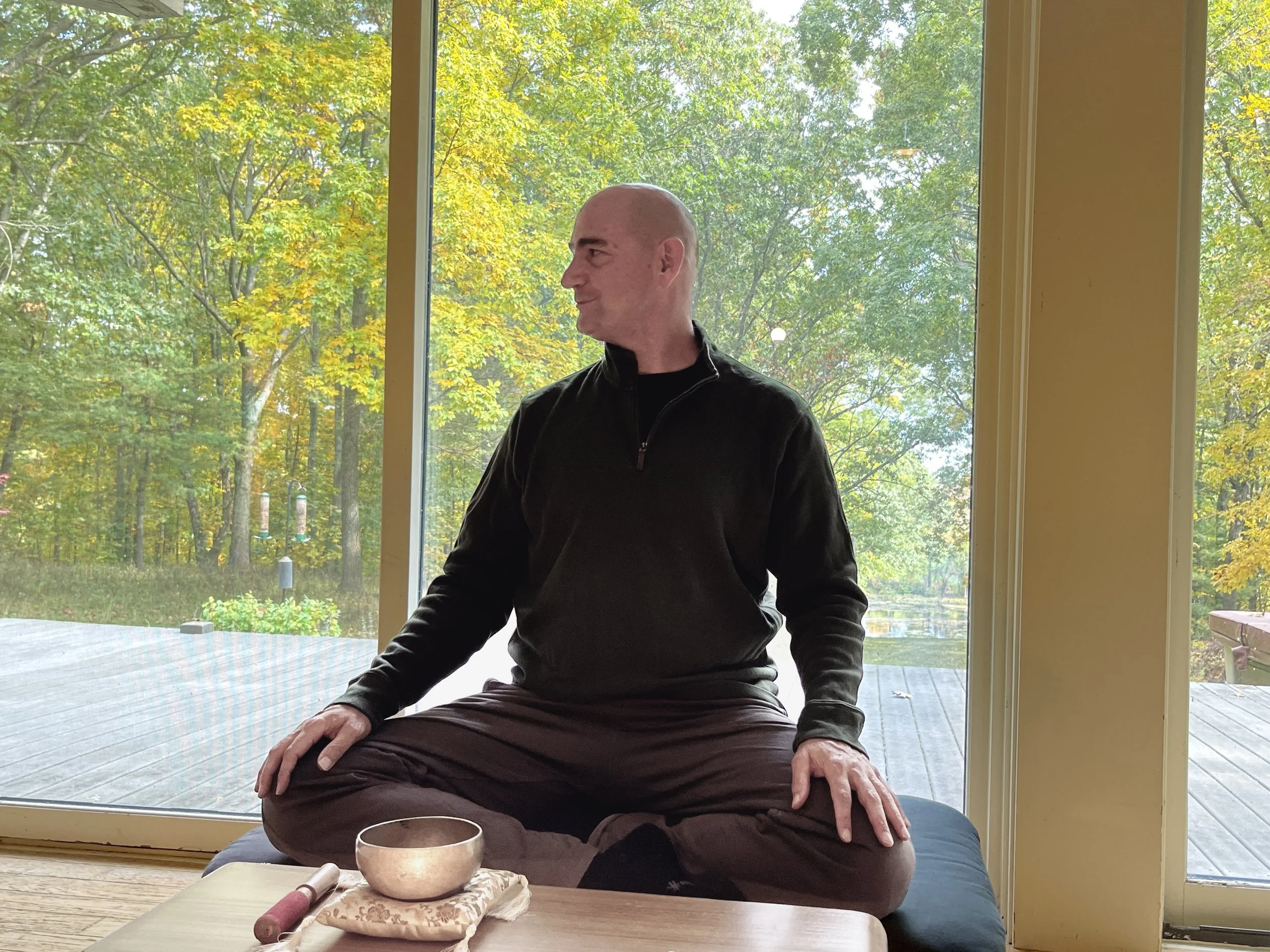 Matthew listening to a student