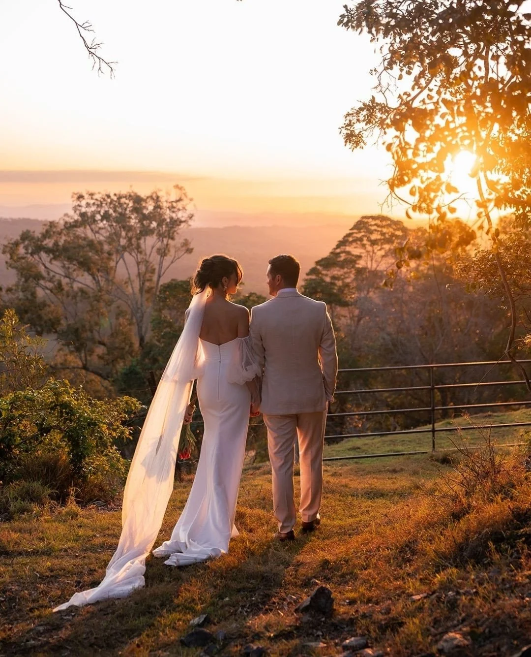 Rainforest Garden's Open Day is this Saturday 17th of Jan! Come have a peek at this incredible venue, surrounded by lush greenery, stunning mountain views, and golden sunsets 💛⁠
⁠
Pictured here the gorgeous Sheridan + Daniel.⁠
⁠
Photographer @figtre