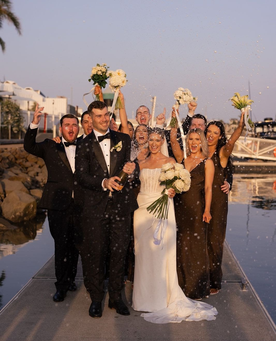 A collection of the sweetest moments from Emily + Lachlan's beautiful day by the pier 🤍⁠
⁠
Photographer @figtreepictures⁠
Venue @pier33mooloolaba⁠
Celebrant @ceremoniesbybernadette⁠
Florist @wylde_magnolia_x⁠
Videographer @brisbanevideocompany⁠
Dres