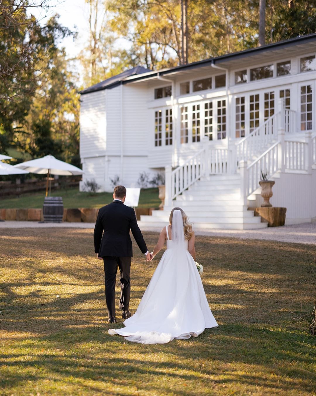A magical day in Mudgeeraba at Kwila Lodge 🤍 Such a beautiful historic setting in the hinterland.⁠
⁠
Photographer @figtreepictures⁠
Venue @kwila.lodge⁠
Celebrant @say_yes_with_tess⁠
Florist @brideandbloomflowers⁠
Dress @spherebridalgallery @chosenby
