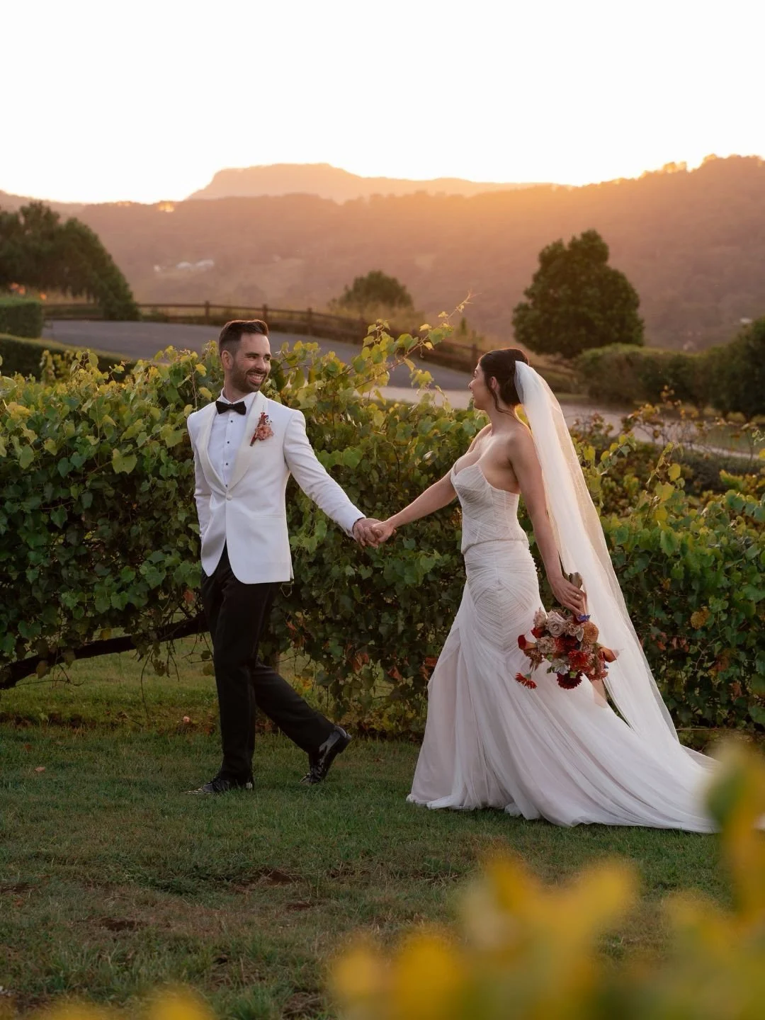 Brittany + Martin lit up by golden hour ✨️ Sweet moments captured for our lovely couple. ⁠
⁠
Photographer @figtreepictures⁠
Venue @summergroveestate⁠
Celebrant @celebrantaf.au⁠
Florist @flowerswithtika⁠
Dress @thewhiteaisle_bridal⁠
Makeup @heididebbi