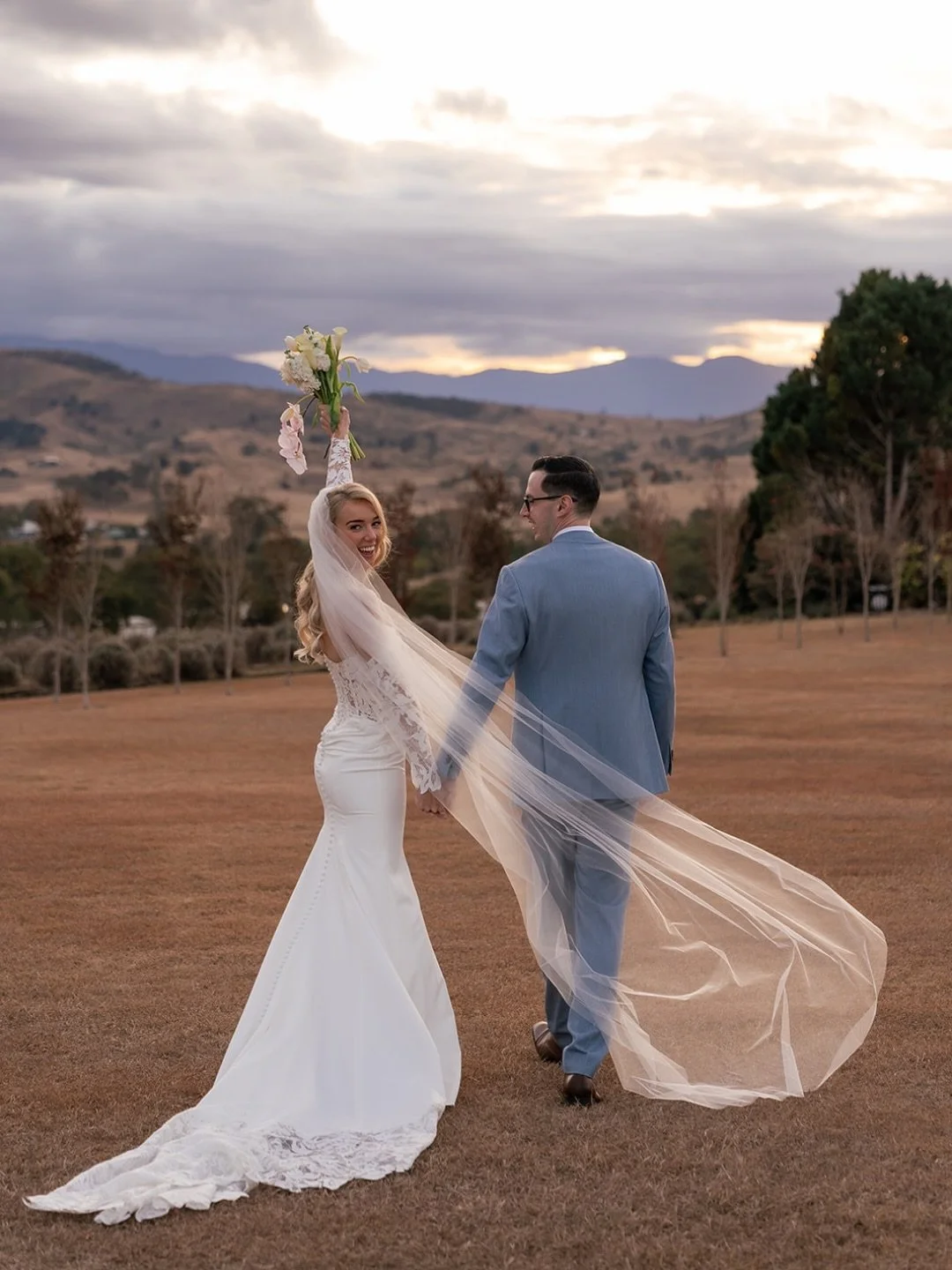 A sneak peek into Jess + Mackenzie&rsquo;s beautiful wedding at Kooroomba Lavender Farm ⁠
⁠
Photographer &amp; videographer @figtreepictures⁠
Venue @kooroomba_lavender_farm @kooroomba_weddings⁠
Dress @whiteatelierbridal⁠
Suit @thecloakroom⁠
Hair &amp