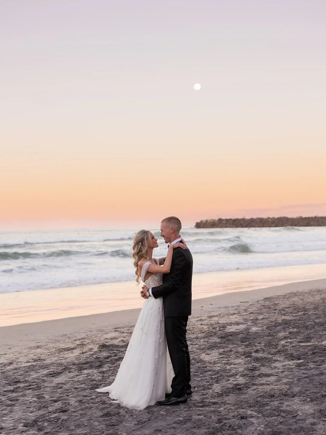 Kate + Zac soaking in a glowing sunset for their wedding at Ancora Weddings ✨⁠
⁠
Photographer @figtreepictures⁠
Venue @ancoraweddings ⁠
Celebrant @itislove.x⁠
Florist, stylist &amp; hire @arcticfox_events⁠
Dress @luvbridal⁠
Bridesmaid dresses @billy_