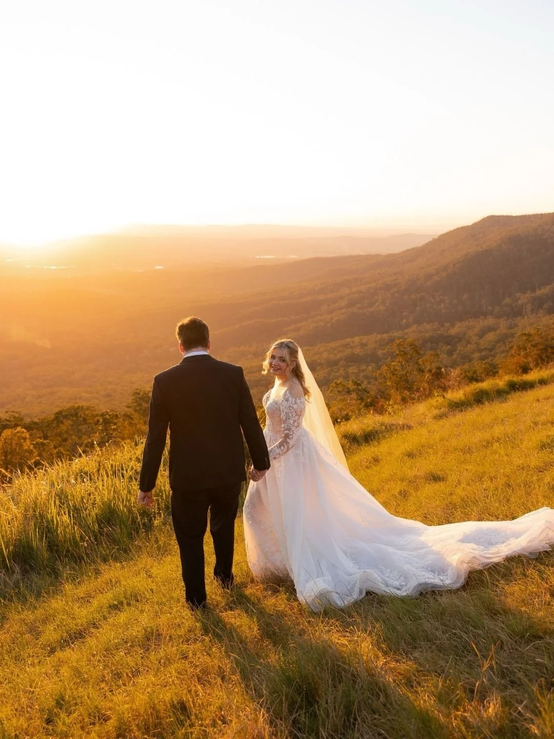 Capturing those soft glances at golden hour on Veronique + Andrew&rsquo;s big day.⁠
⁠
Photographer @figtreepictures⁠
Venue @tamborinemountainglades 
Florist @flowersbyericalilli 
Hair &amp; makeup @bella_brides 
Entertainment @explosiveent_goldcoast⁠