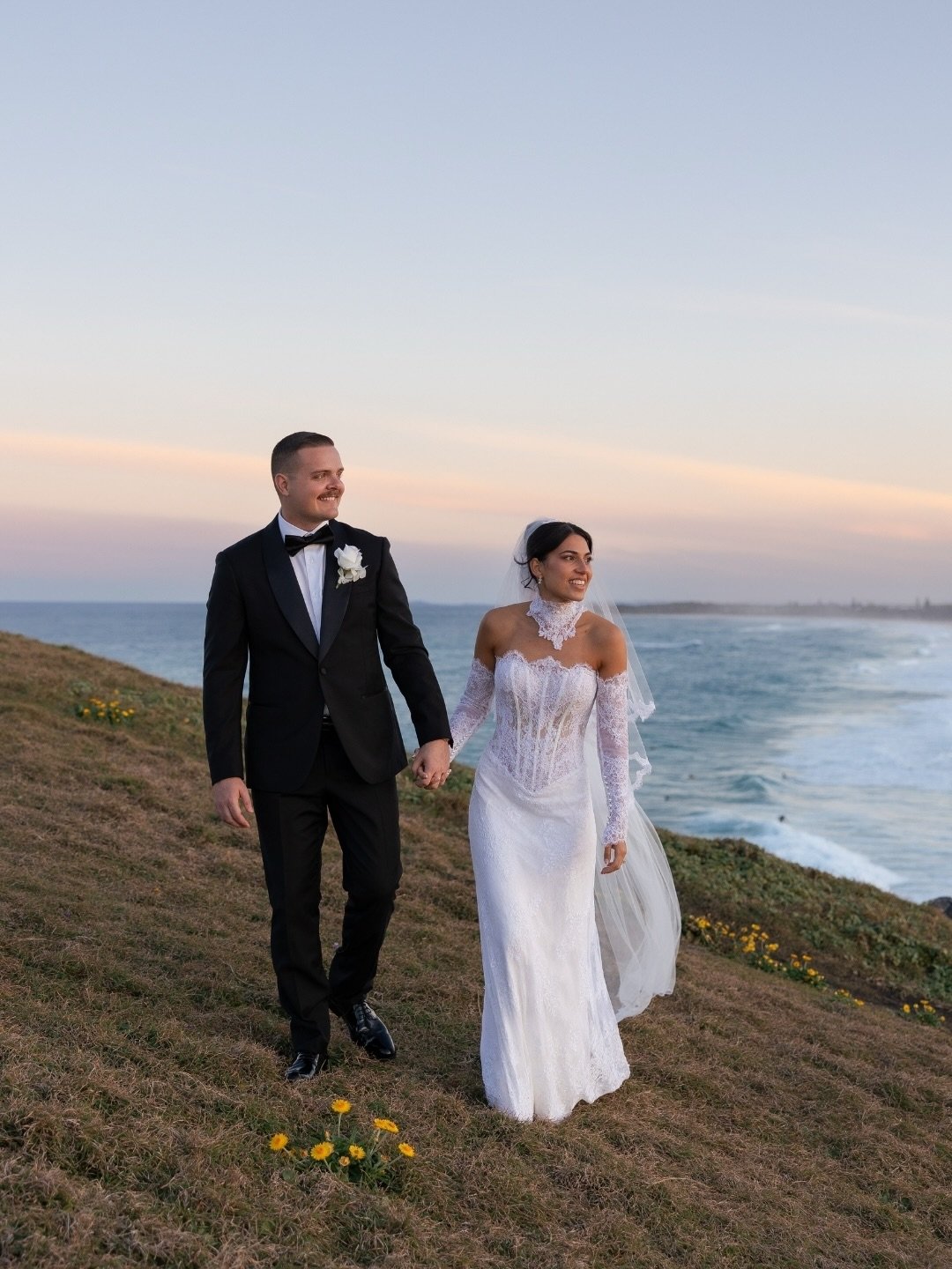 Nataya + Daniel are married! Beautiful coastal frames of our lovely couple on their special day &hearts;️

Photographer @figtreepictures
Venue @osteriaweddings 
Florist &amp; stylist @auroraandcoevents 
Content creator @curatedbyus.weddings 
Dress @v