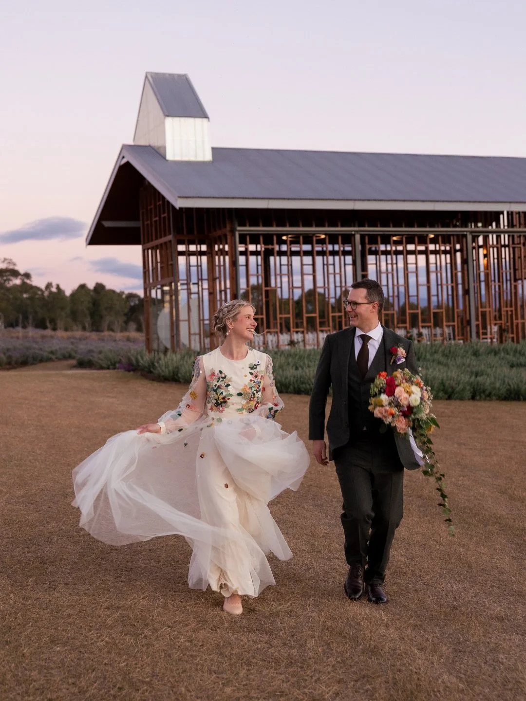What an absolute delight to capture Jen + Henry&rsquo;s colourful wedding at Kooroomba Lavender Farm ✨

Photographer @figtreepictures
Venue @@kooroomba_weddings
Celebrant @country_wed
Florist @saintandstemflorist
Dress @puyan.saheb.djavaher
Suit @the