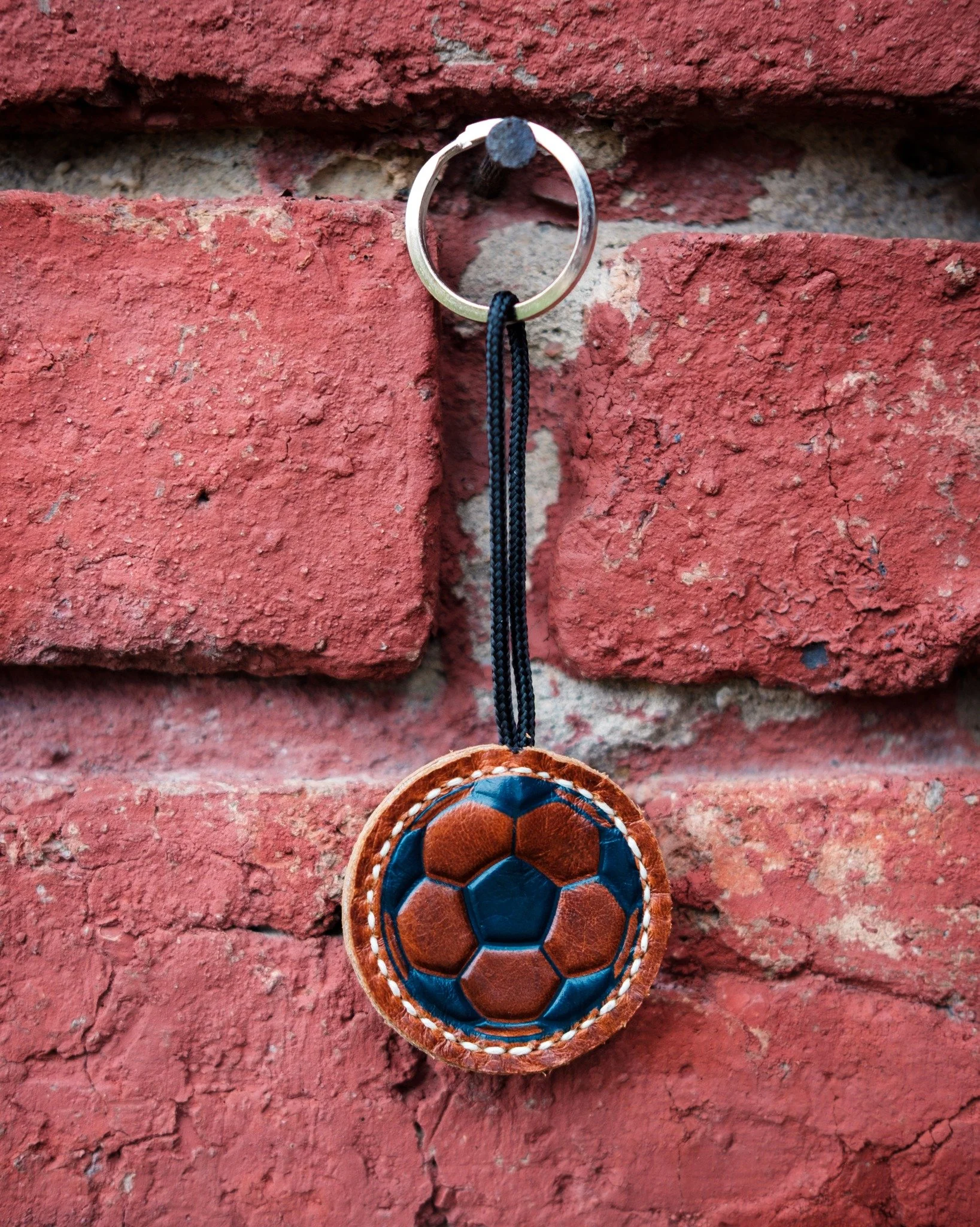 Handmade in Mongu&iacute;, Boyac&aacute;, these leather keychains&mdash;affectionately called &ldquo;arepas&rdquo;&mdash;from La Tienda del Bal&oacute;n (@latiendadelbalon) celebrate a treasured soccer ball&ndash;making tradition that dates back to t