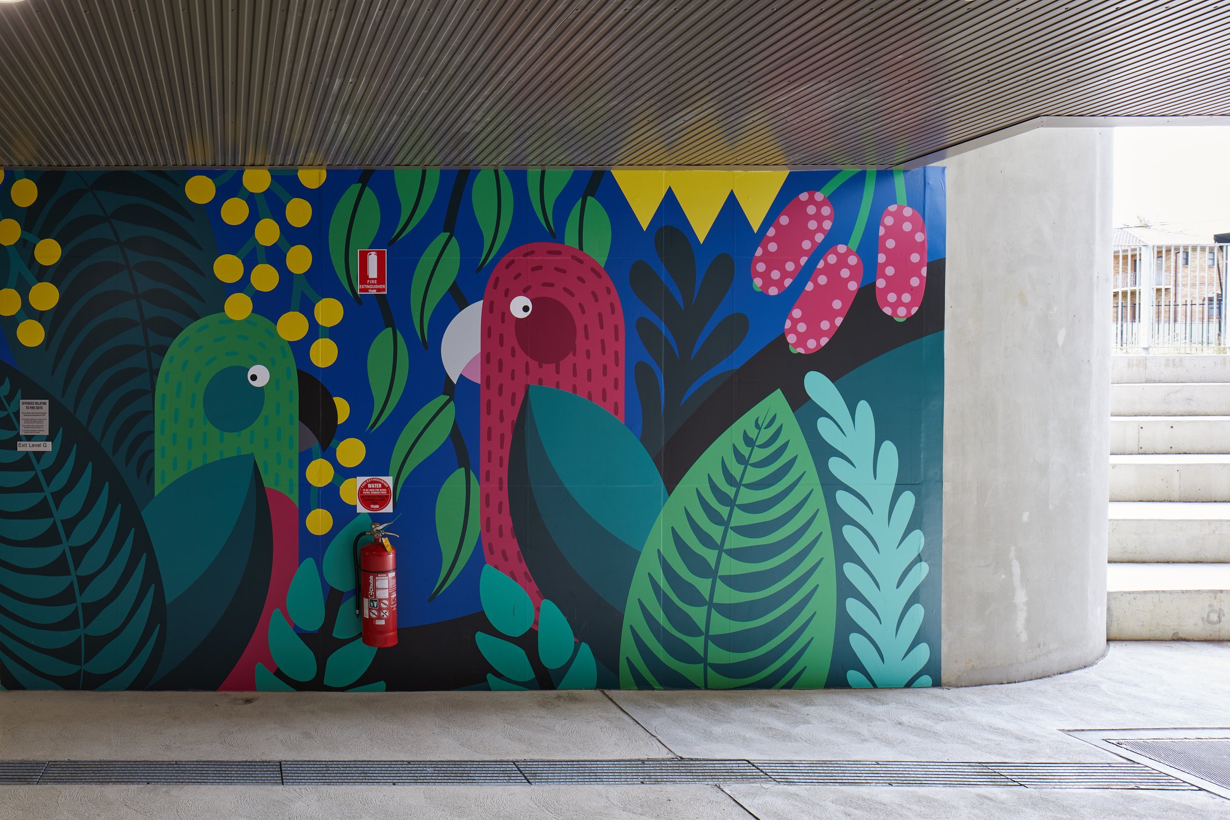 Vibrant artwork brings a sense of playfulness and joy to exterior communal spaces at Kent Road Public School. Columns have been painted and digital prints applied for a seamless finish.