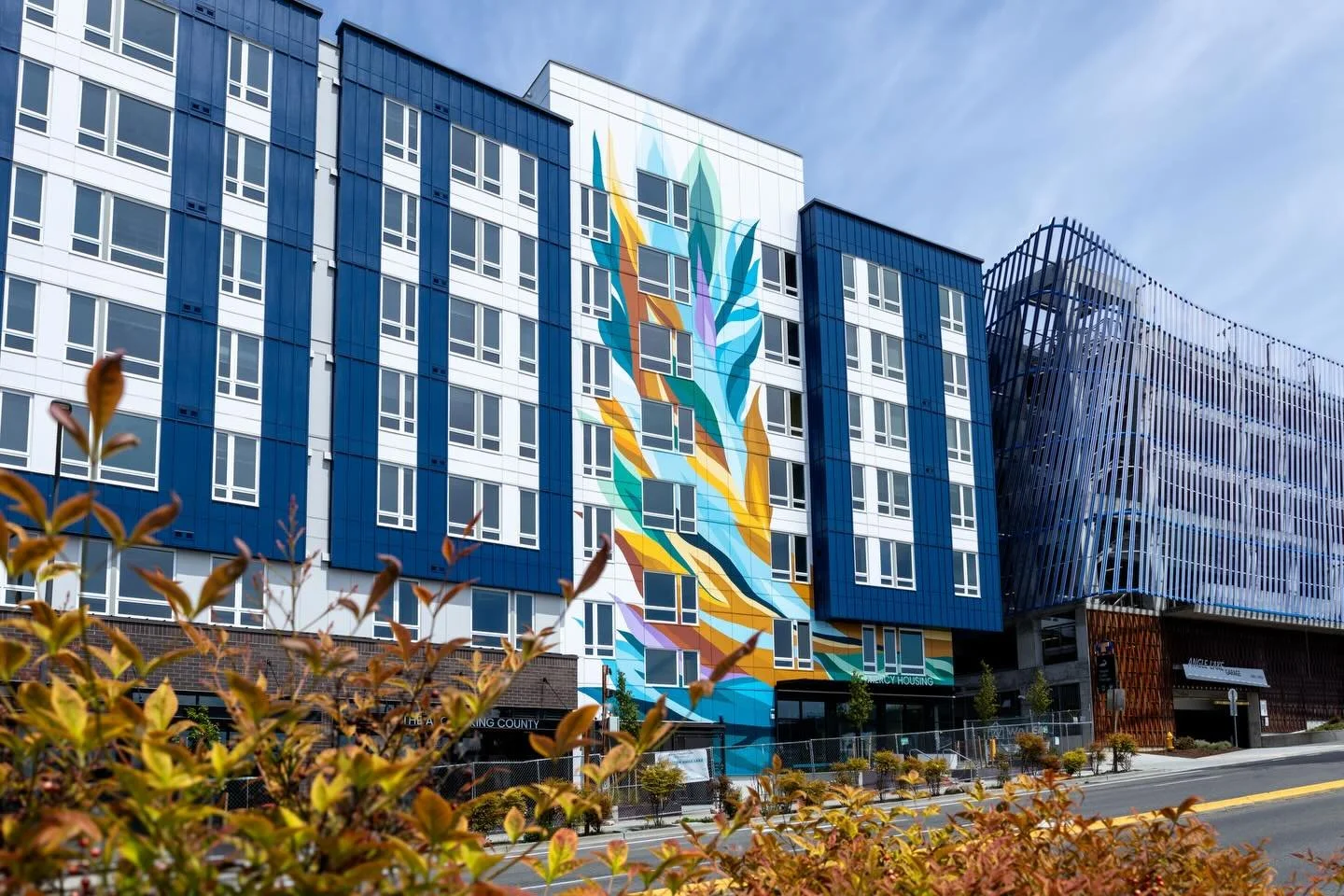 Vertical Bloom, 2025 🪽
Angle Lake, SeaTac

This mural grew from learning about the neighborhood and its connection to flight. I wanted it to feel rooted, soft, and alive. 

Created for a building that supports people of all abilities and walks of li