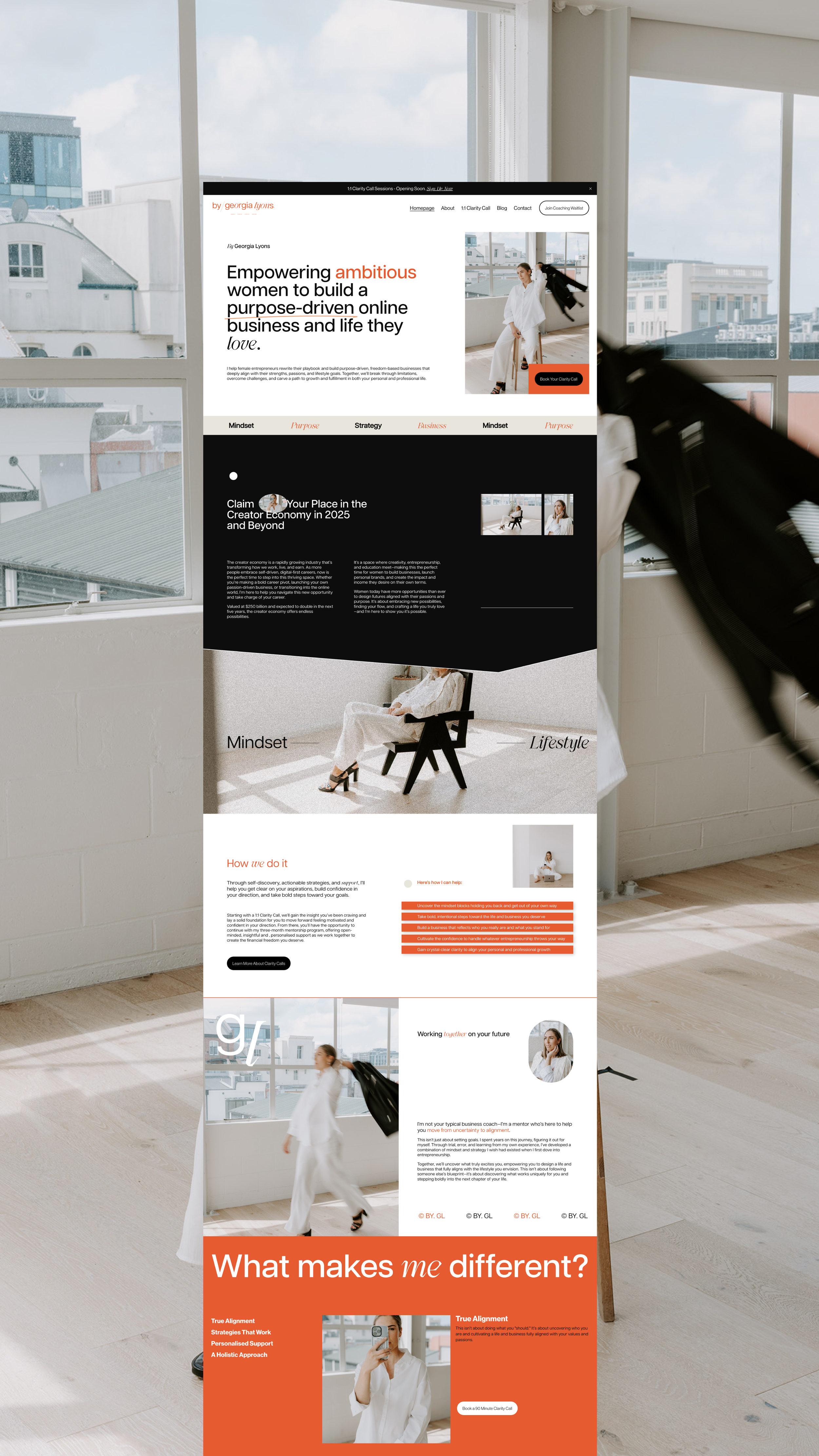 A woman in a white outfit walking through a bright room with large windows in an urban office setting, carrying a black bag.