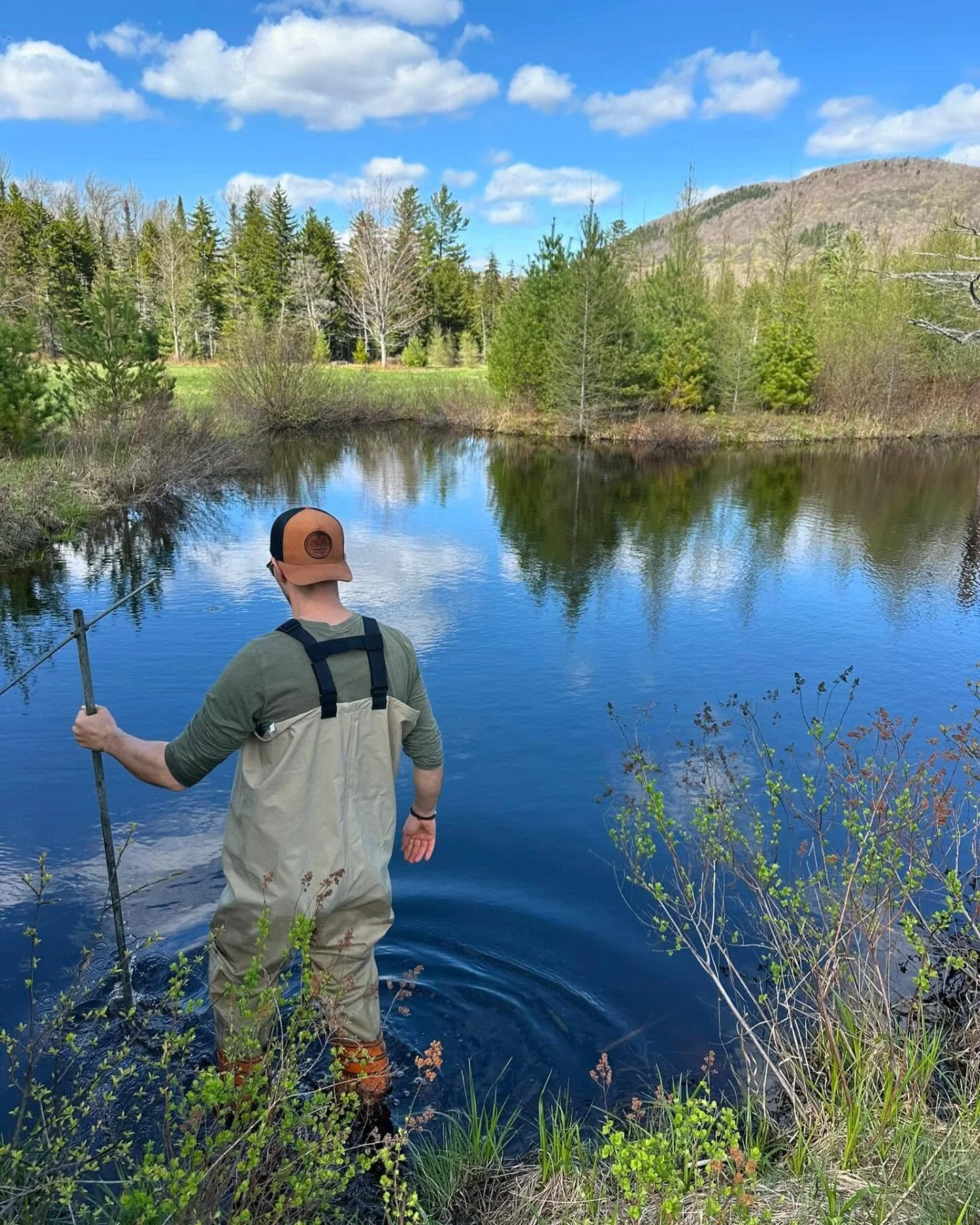 One of our owners, Lukas, making sure the water is flowing properly after beavers 🦫 started making their own dam.