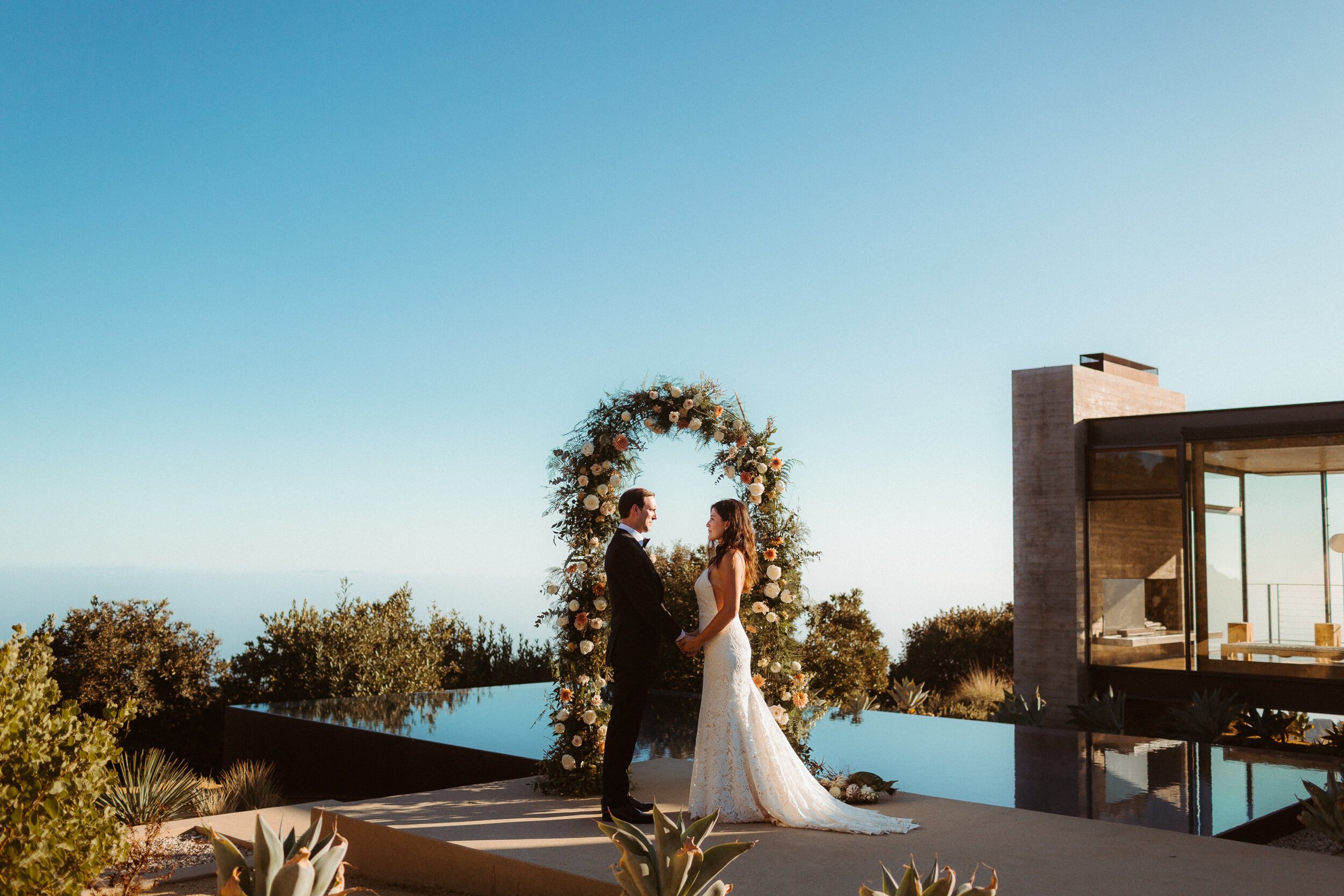 malibu dream wedding underneath a beautiful fresh floral arch (Copy)