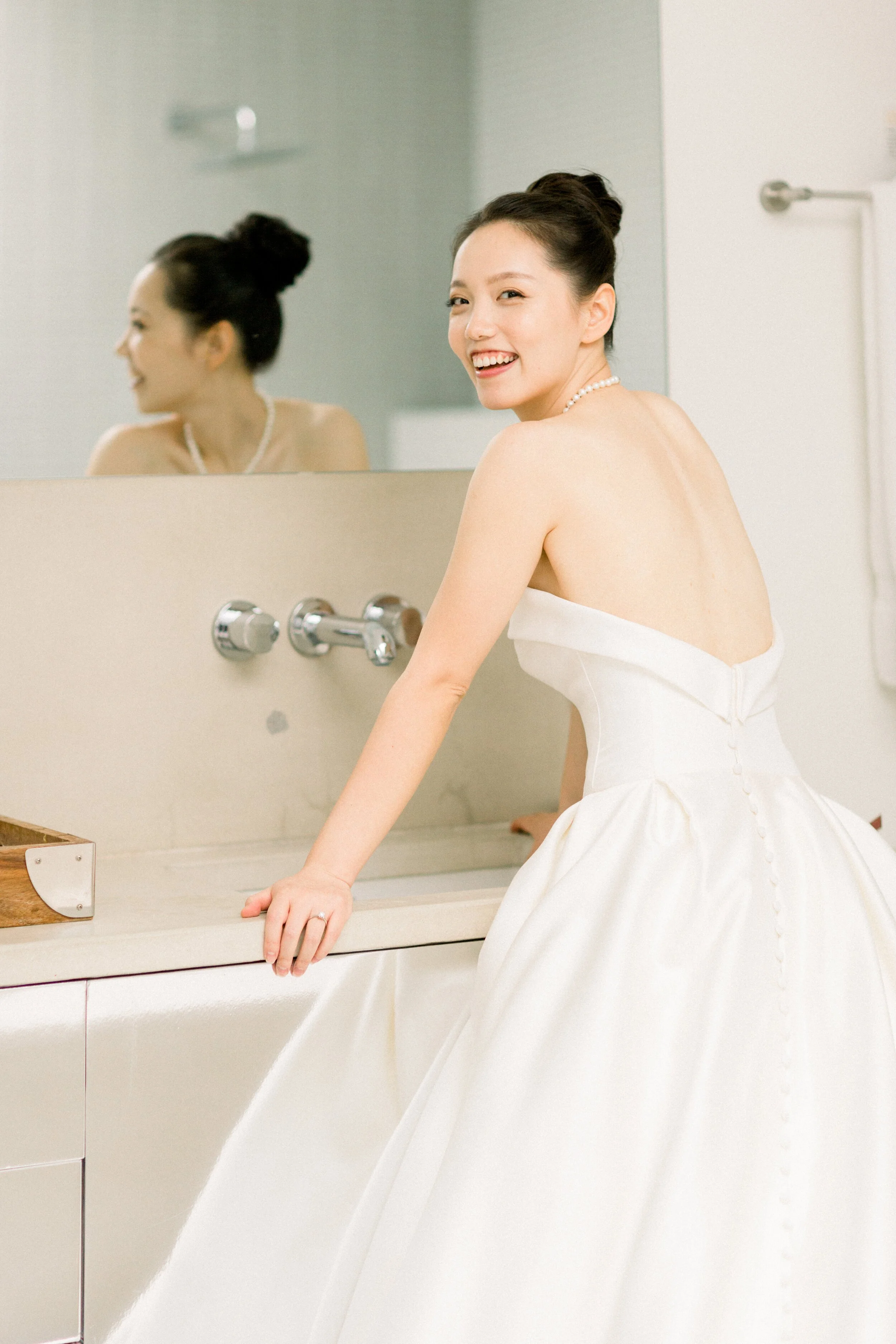 kim sing theatre bride as she gets ready for her small, intimate wedding ceremony