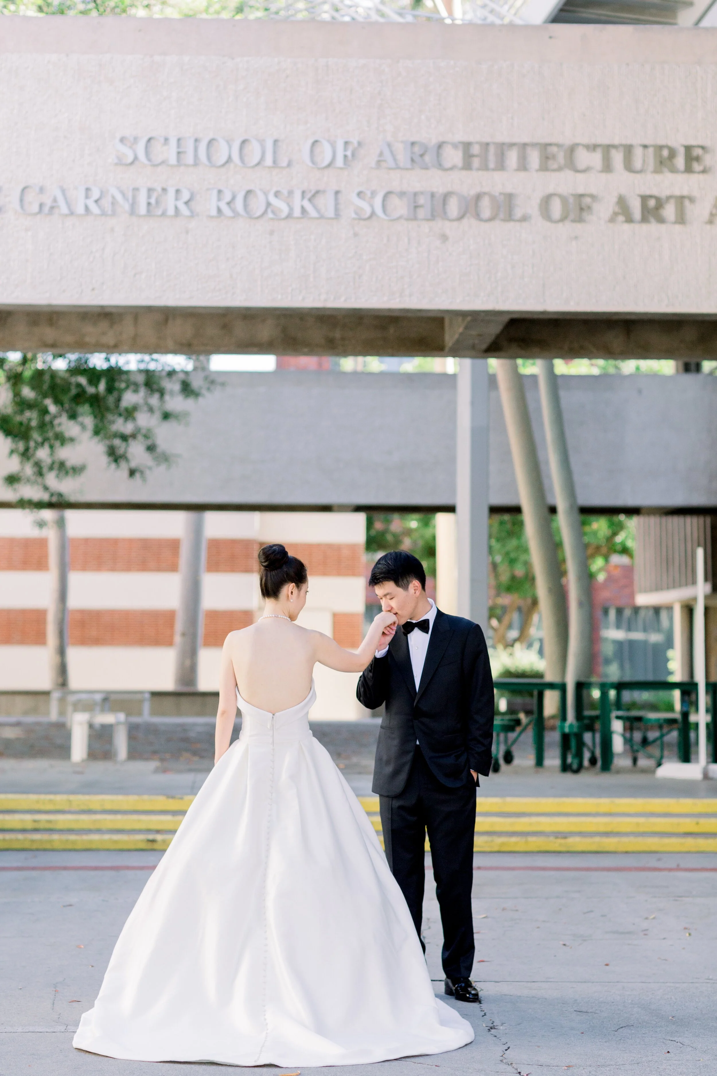 bride and groom meet at USC for wedding photos