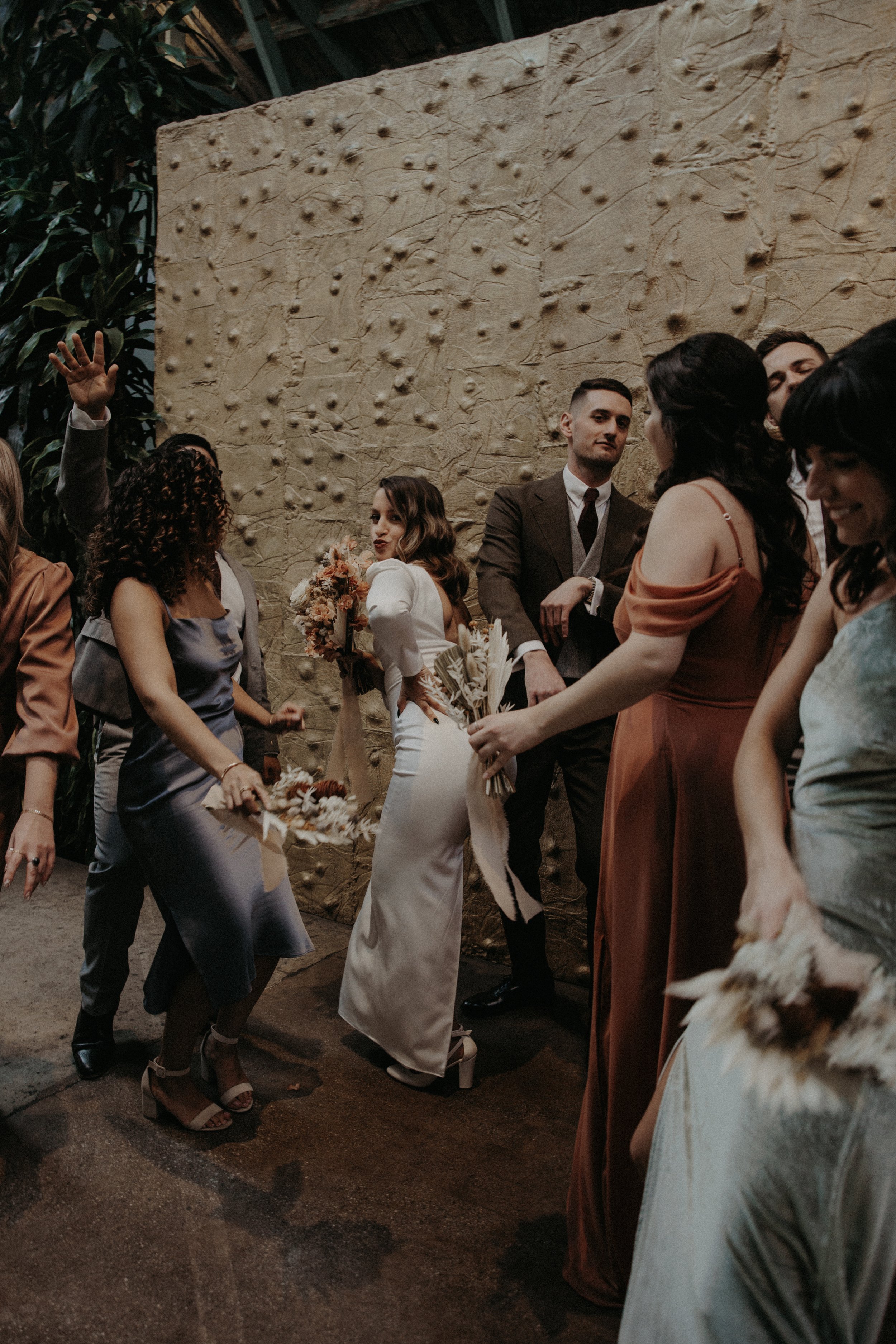 bridal party let loose before their millwick wedding in downtown LA