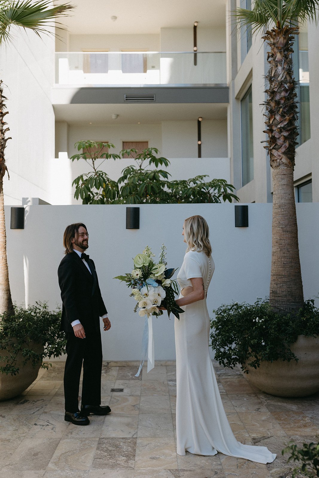 bride and groom have sweet first look moment at the santa monica proper hotel