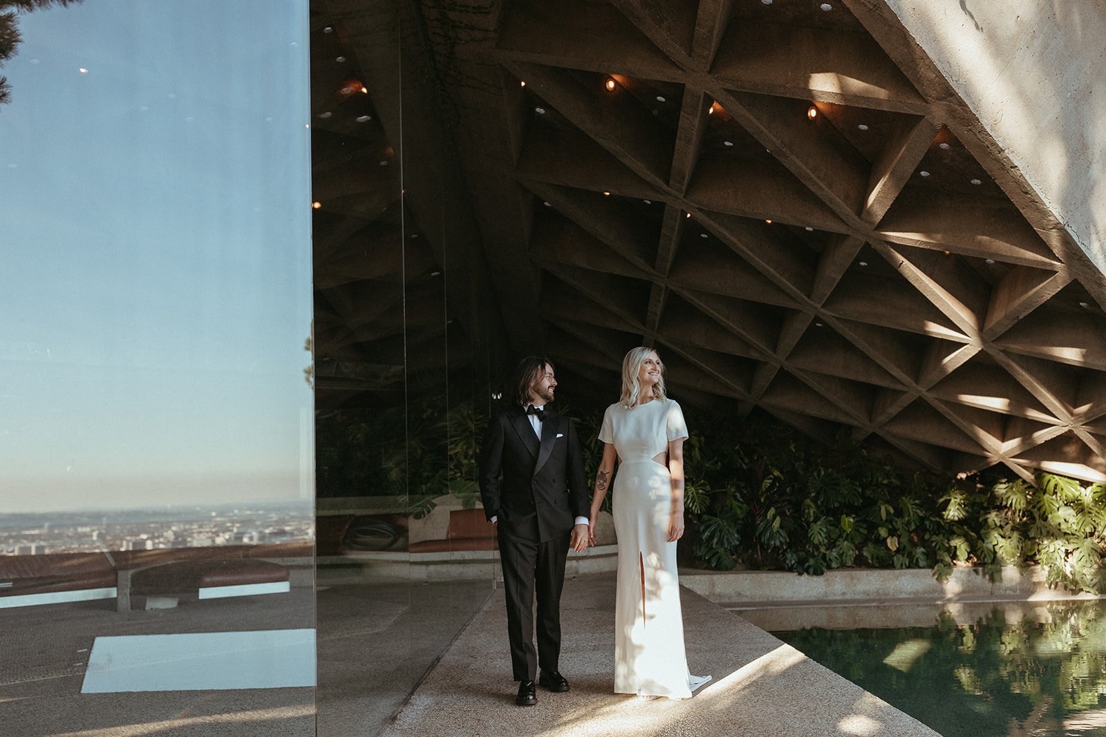 wedding day hair and makeup for this couple's elopement at the Sheats–Goldstein Residence