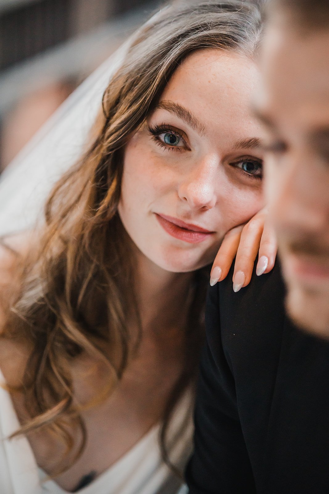 bride's 60's makeup look was made complete with a bold winged eyeliner