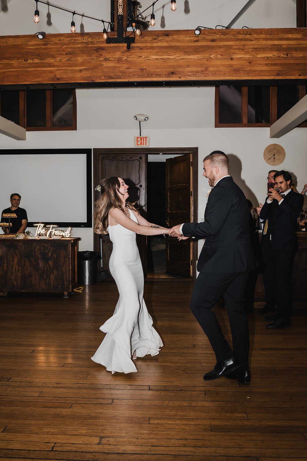 couple share first dance at their wedding reception at the 1909 in topanga canyon