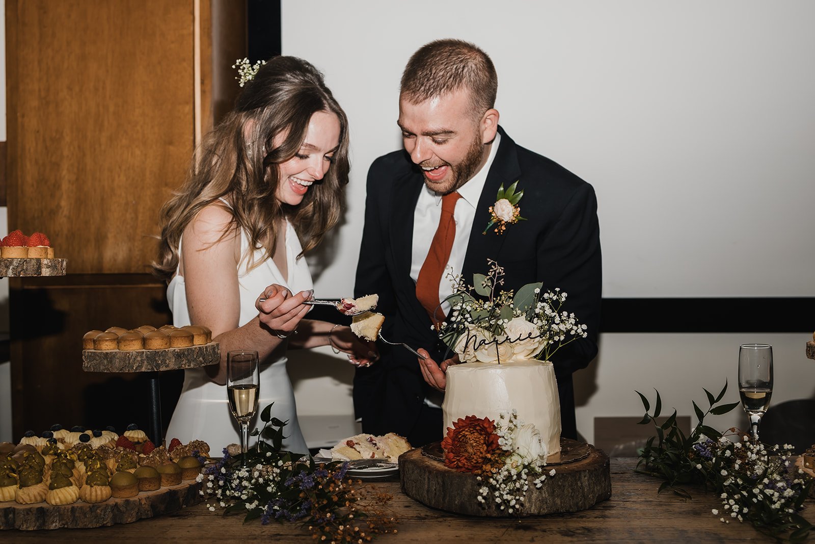 couple gets married in topanga and cuts the cake together at their wedding reception
