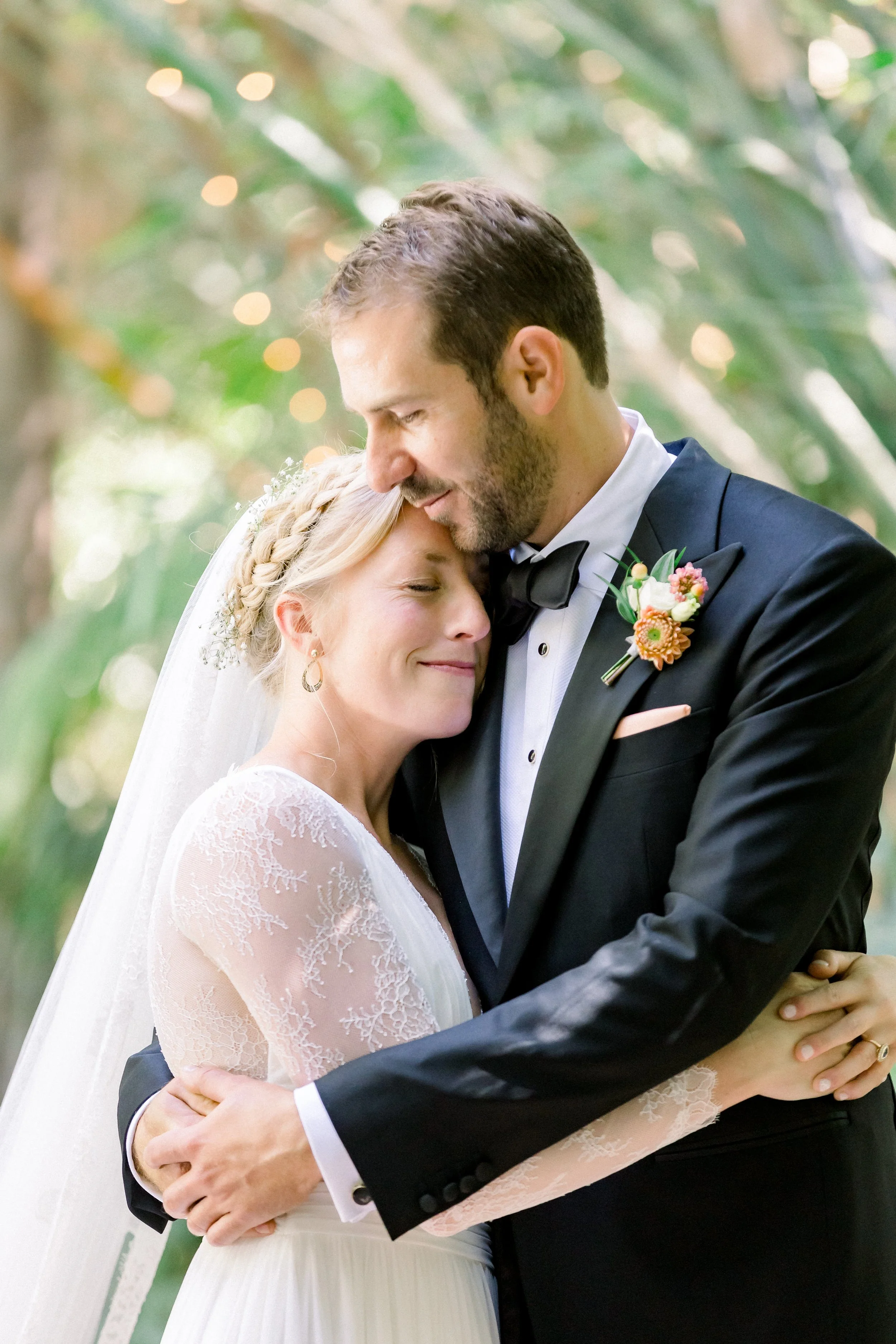 Whimsical braided crown hairstyle for this bride’s fairytale wedding at Whimsical braided crown hairstyle for this bride’s fairytale wedding at