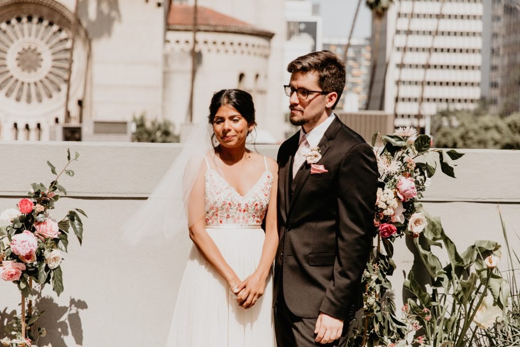 bride wanted natural, soft makeup and a romantic, loose updo for her rooftop wedding at the line hotel