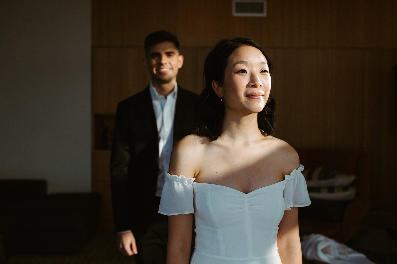 bride and groom take artsy and funky bridal portraits on their wedding day with the hendrys