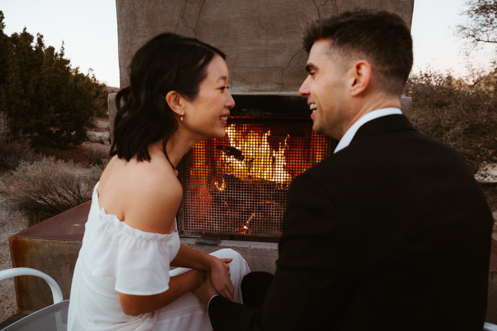 after the intimate wedding ceremony, our couple goes back to their airbnb to sit by the fire and enjoy their view