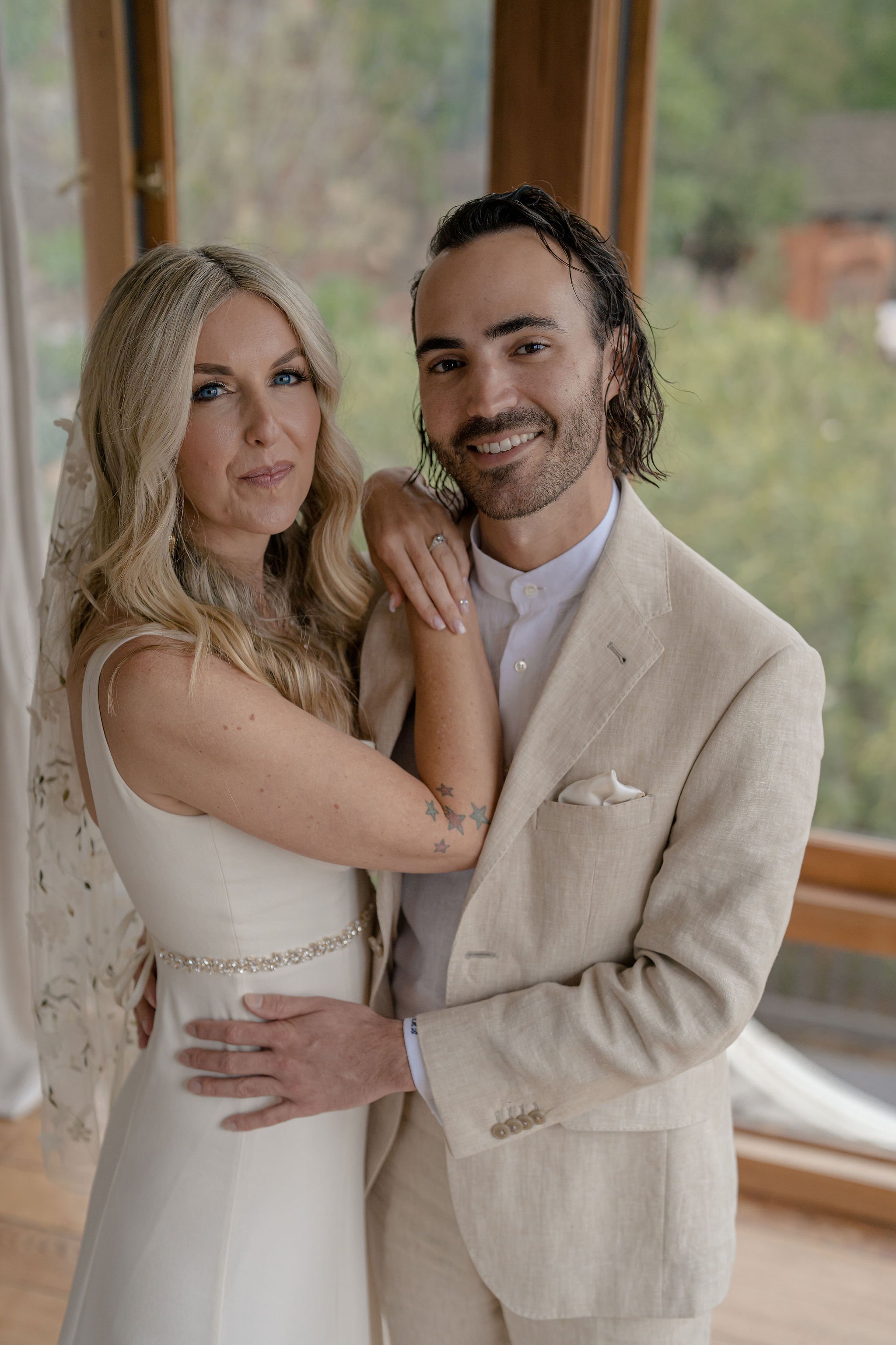 bride and groom take pre-ceremony portraits at their topanga canyon airbnb 
