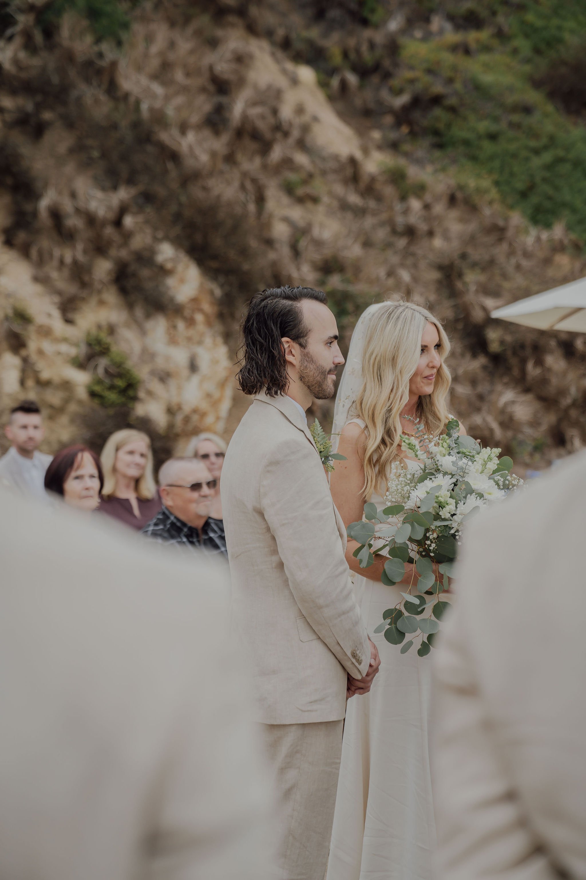 wedding ceremony at the edge of point dume beach in malibu